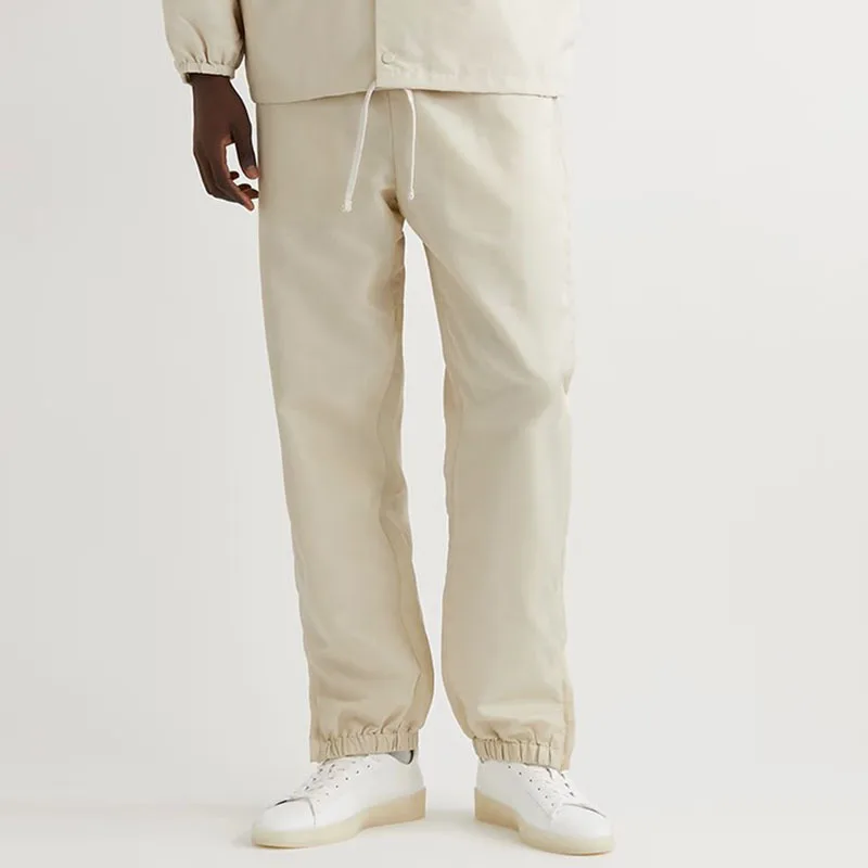 Мужские брюки FEWQ с двойной нитью Новый однотонный дизайн с завязками 2023 Новый Корейский модный тренд Мужские брюки Повседневные 24X1722 Изображение 1